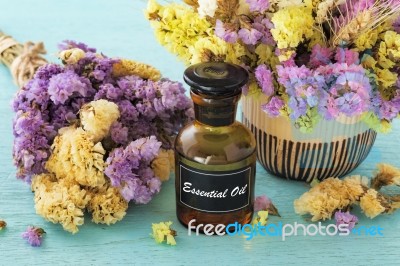 Essential Oil With Flower Stock Photo