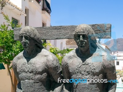 Estepona, Andalucia/spain - May 5 : Sculpture Of Two Men In Este… Stock Photo