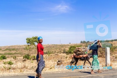 Ethiopian Woman Walking On The Road Stock Photo