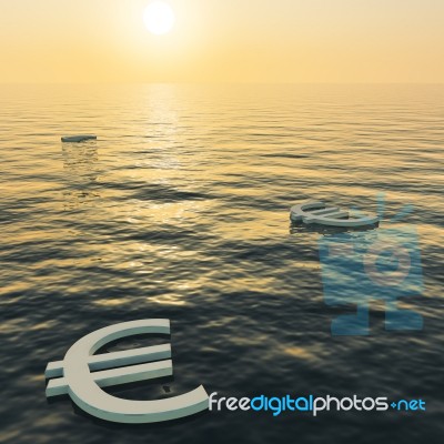 Euro Floating In Sea At Sunset Stock Image