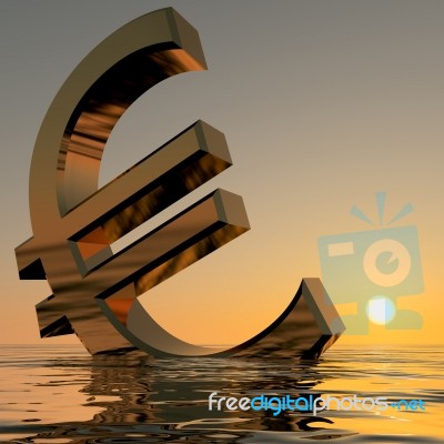 Euro Sinking In Sea At Sunset Stock Image