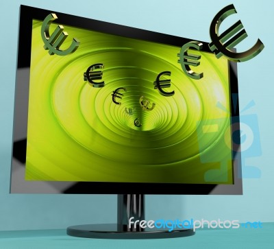 Euro Symbols From Computer Screen Stock Image