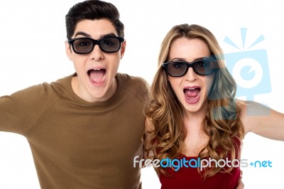 Excited Boy And Girl Cheering Loudly Stock Photo