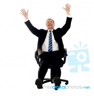 Excited Businessman Celebrating His Success Stock Photo