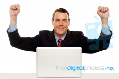 Excited Businessman Celebrating Success Stock Photo