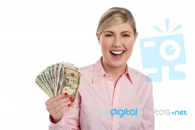 Excited Girl Holding Currency Notes Fan Stock Photo