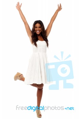 Excited Girl Raising Her Hands Stock Photo