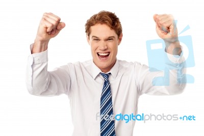 Excited Young Male Executive Stock Photo