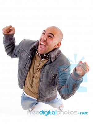 Excited Young Man Posing Stock Photo