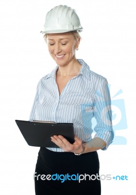 Experienced Builder Wearing Helmet Stock Photo