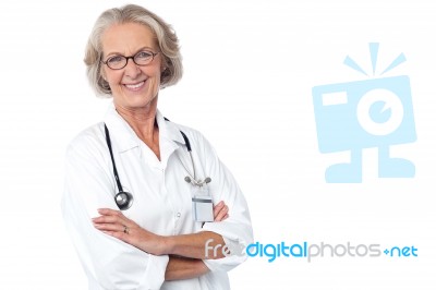 Experienced Lady Doctor With Stethoscope Stock Photo