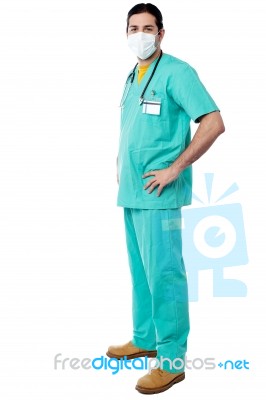 Experienced Surgeon With Hands On His Waist Stock Photo