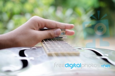 Expert Musician Plays A Dobro Guitar Stock Photo