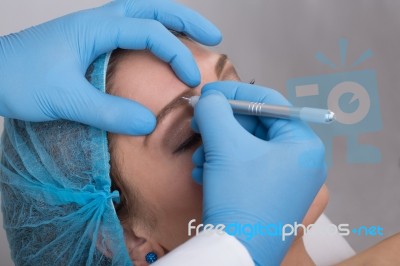 Eyebrow Tattoo Stock Photo