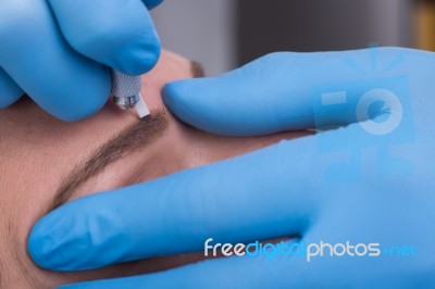 Eyebrow Tattoo Stock Photo