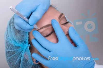 Eyebrow Tattoo Stock Photo