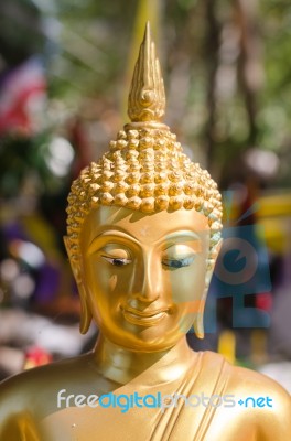 Face Of Golden Buddha Sculpture, Thailand Stock Photo