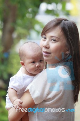 Face Of Newborn Infant With Mom Use For Baby And Motherhood Heal… Stock Photo