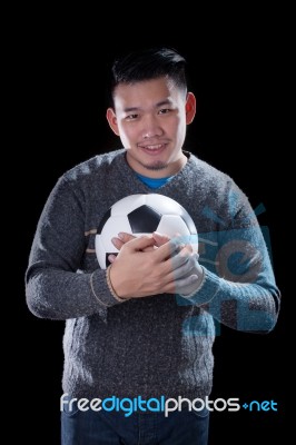 Face Of Soccer Lover Holding Football Ball Isolated Black Background Use For Sport And People Activities Theme Stock Photo