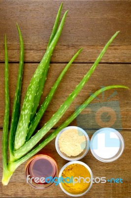 Facial Treatment Recipe With Fresh Aloe Vera On Wood Background Stock Photo