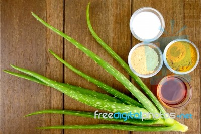 Facial Treatment Recipe With Fresh Aloe Vera On Wood Background Stock Photo