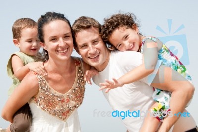 Family In The Beach Stock Photo