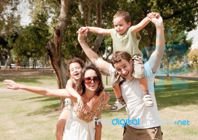 Family In The Park Stock Photo