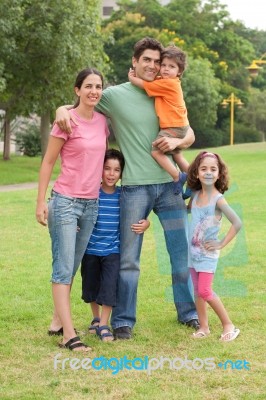 Family In The Summer Park Stock Photo