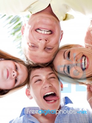 Family Members Keeping Their Heads Together Stock Photo