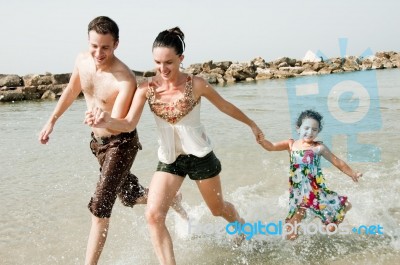 Family On The Beach Stock Photo