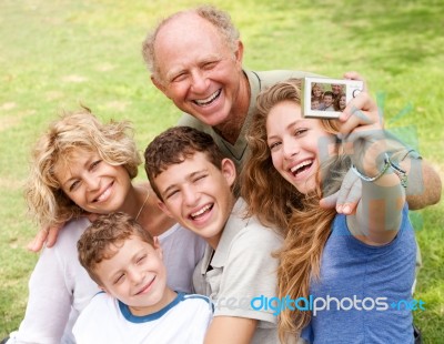 Family Outdoors Taking Self Portrait Stock Photo