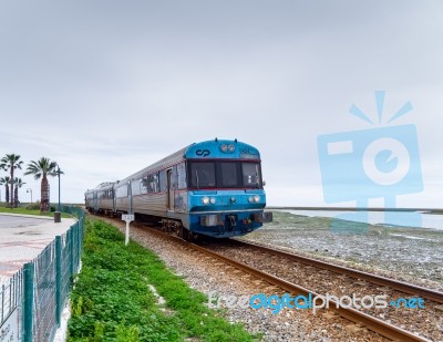 Faro, Southern Algarve/portugal - March 7 :train Approaching Far… Stock Photo