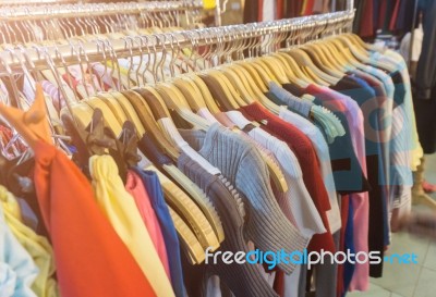 Fashion Clothing On Hangers At The Show Stock Photo