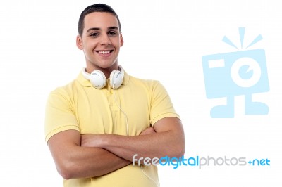 Fashion Guy With Headphones Around His Neck Stock Photo