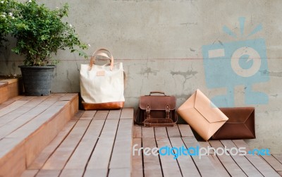 Fashion Leather Bags On Grunge Background Stock Photo