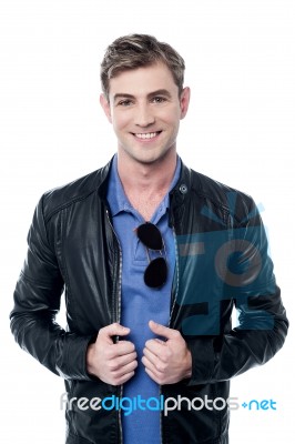 Fashion Man In Leather Jacket And Glasses Stock Photo