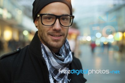 Fashion Man On Street, Blurred City Background Stock Photo