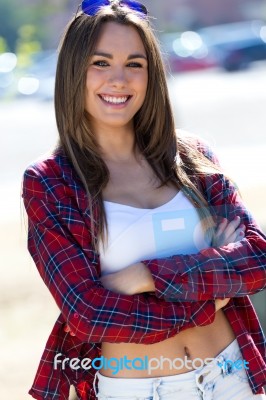 Fashion Portrait Of Beautiful Girl In The City Stock Photo