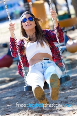 Fashion Portrait Of Beautiful Girl In The City Stock Photo