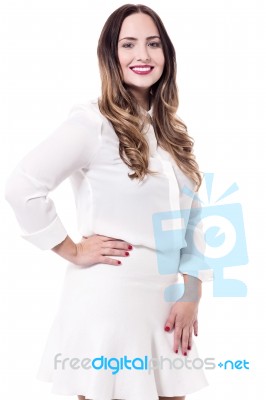 Fashionable Woman In A White Dress Stock Photo