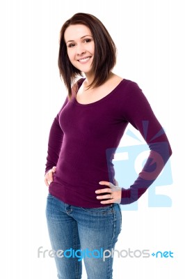 Fashionable Young Woman Striking A Stylish Pose Stock Photo