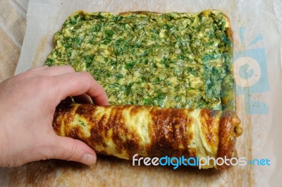 Fastening Omelette With Herbs In Roll Stock Photo