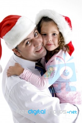 Father And Daughter Wearing Hat Stock Photo