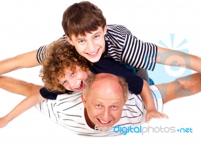 Father Having Fun With Kids Stock Photo