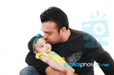 Father Kissing His Daughter Stock Photo