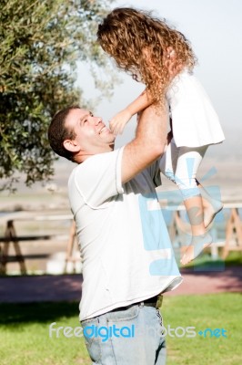 Father Playing With Daughter Stock Photo