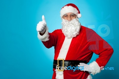 Father Santa Gesturing Thumbs Up Stock Photo