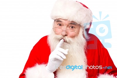 Father Santa Telling Secrets, Shh!! Stock Photo