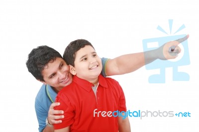 Father Showing Something To His Son Stock Photo