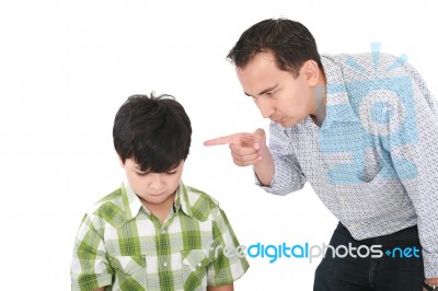 Father Threatening His Son Stock Photo